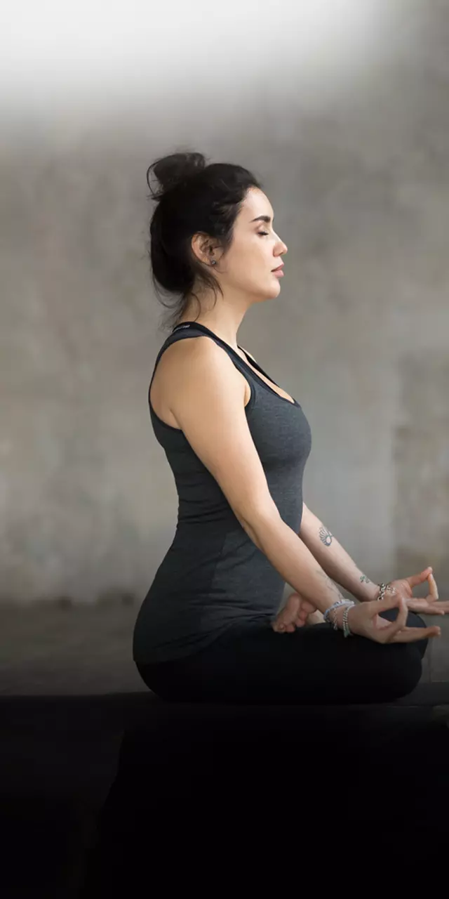 Woman sitting in Vajrasana pose with Namaste behind the back Stock Photo by  ©Milkos 331511142
